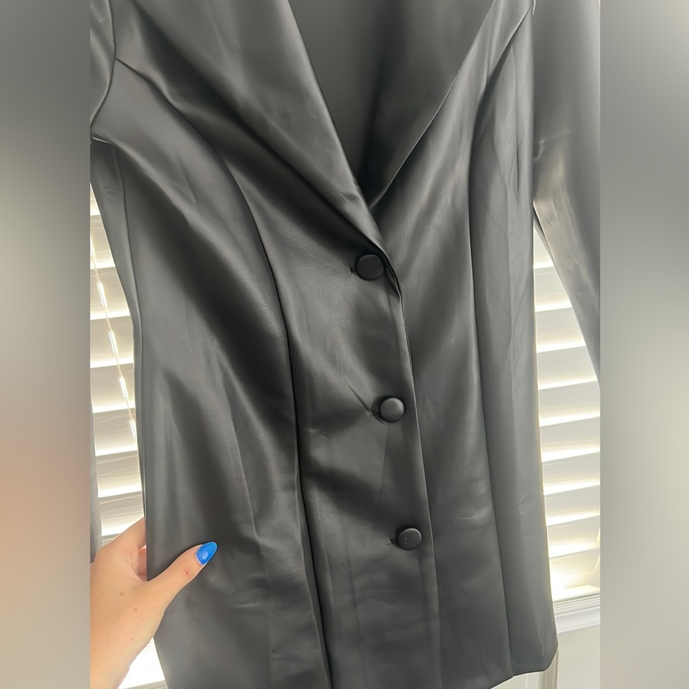 Black long women’s pleather 3 button jacket. Size small